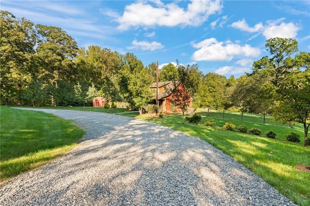 2108 Glenside Dr, Greensboro, NC 27405 - view of street with a wooded view