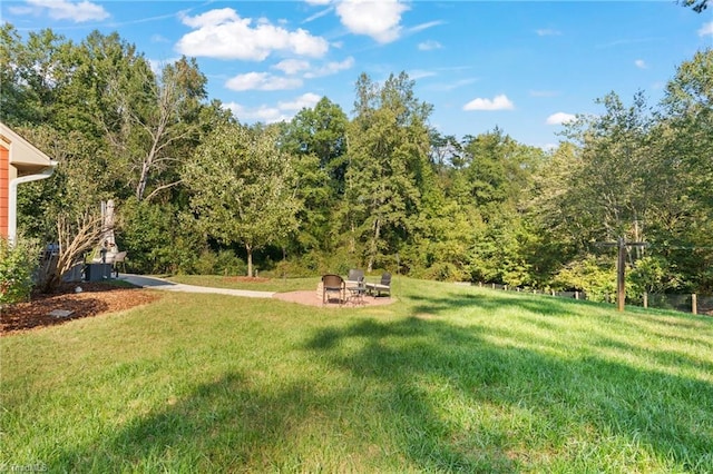 2108 Glenside Dr, Greensboro, NC 27405 - view of grassy yard featuring a fire pit