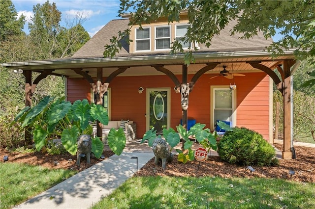 2108 Glenside Dr, Greensboro, NC 27405 - view of front of home featuring ceiling fan, a porch, and a shingled roof