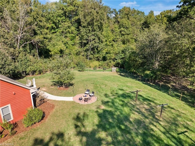 2108 Glenside Dr, Greensboro, NC 27405 - view of yard featuring a patio area and an outdoor fire pit