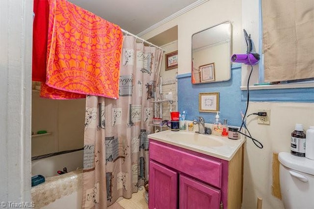 full bathroom with toilet, vanity, shower / bath combo, and ornamental molding