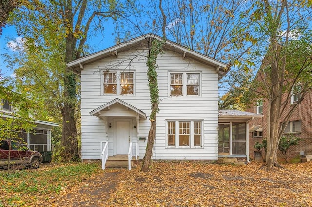 view of property featuring a sunroom