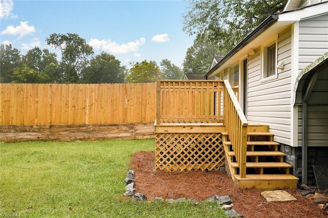 view of yard with a wooden deck