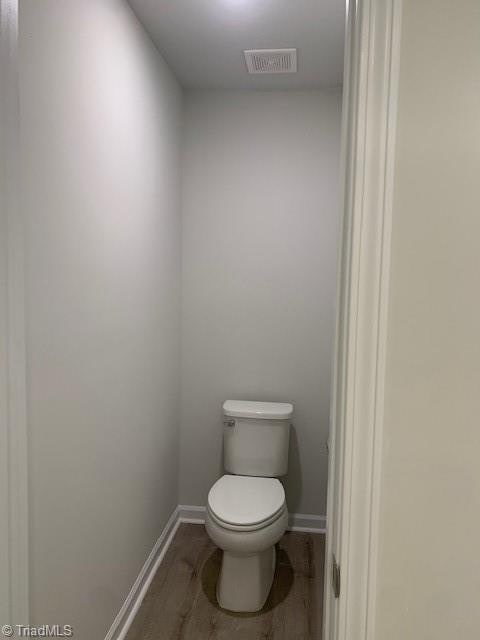 bathroom featuring toilet