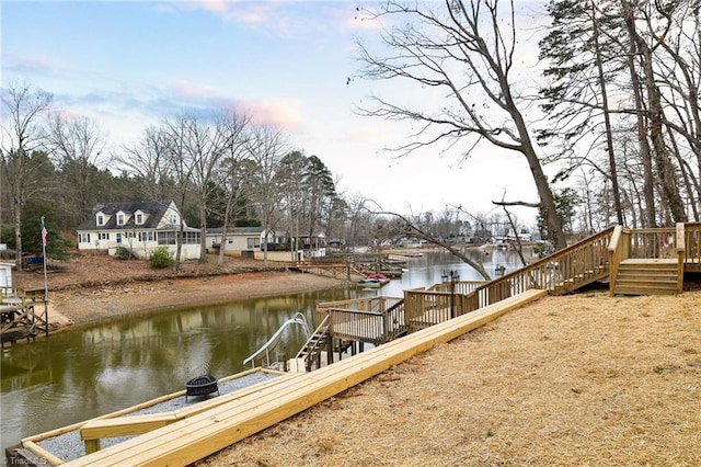 dock area featuring a water view