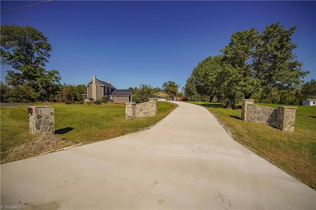 view of community featuring a lawn