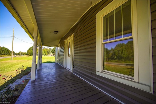 deck featuring a yard