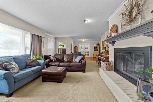 1805 Guilford College Rd, Jamestown, NC 27282 - carpeted living room with ornamental molding, a textured ceiling, and a large fireplace