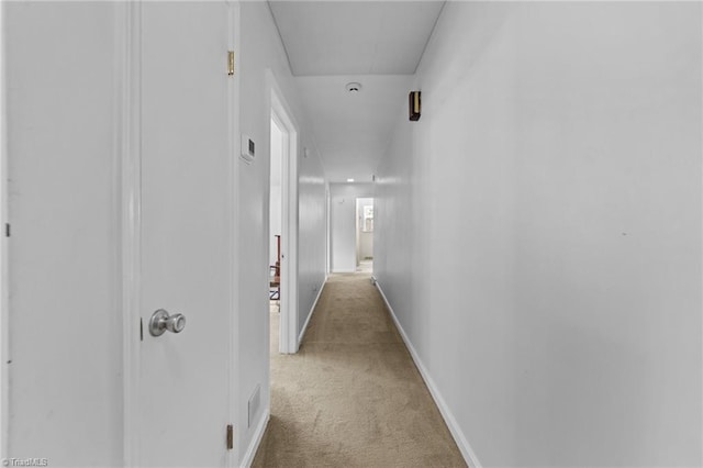 1805 Guilford College Rd, Jamestown, NC 27282 - hallway featuring carpet floors and baseboards