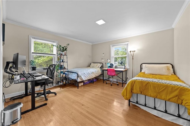 1805 Guilford College Rd, Jamestown, NC 27282 - bedroom featuring wood finished floors, ornamental molding, an office area, and baseboards