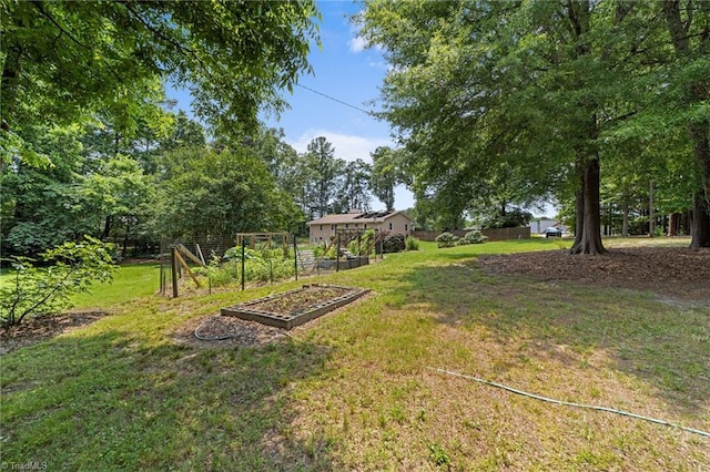 1805 Guilford College Rd, Jamestown, NC 27282 - view of yard featuring a vegetable garden