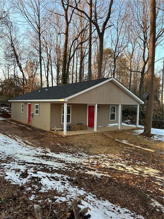 view of front of home featuring covered porch