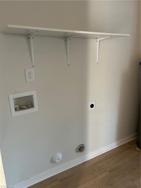 clothes washing area featuring washer hookup, dark hardwood / wood-style floors, and hookup for an electric dryer