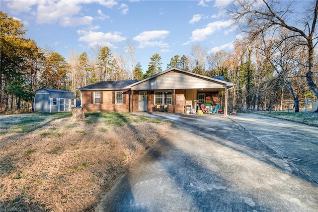 ranch-style home with a shed