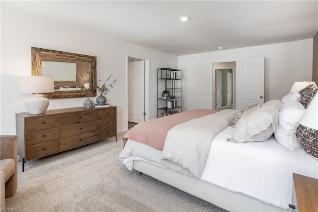 bedroom with carpet and recessed lighting