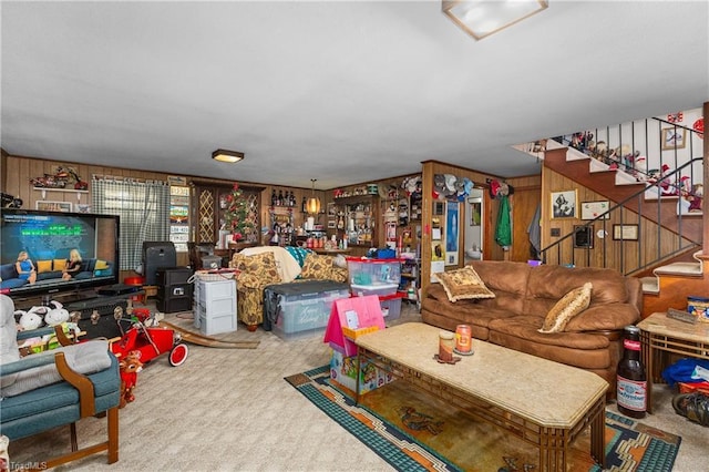 6115 Winview Heights St, Clemmons, NC 27012 - living area with carpet flooring, stairs, and wood walls