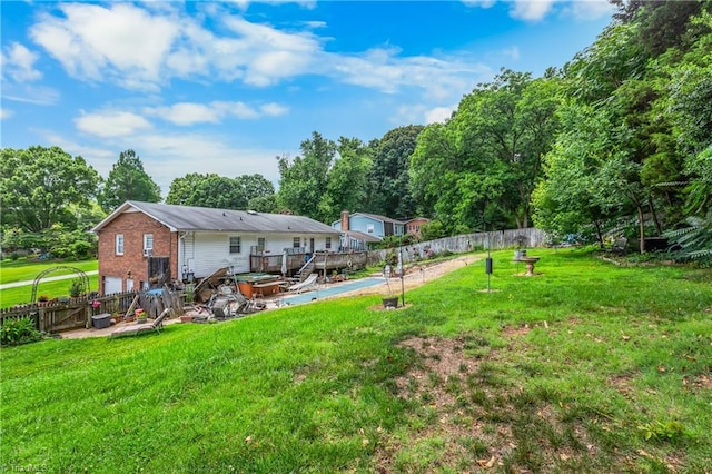 6115 Winview Heights St, Clemmons, NC 27012 - view of yard featuring a wooden deck and an attached garage