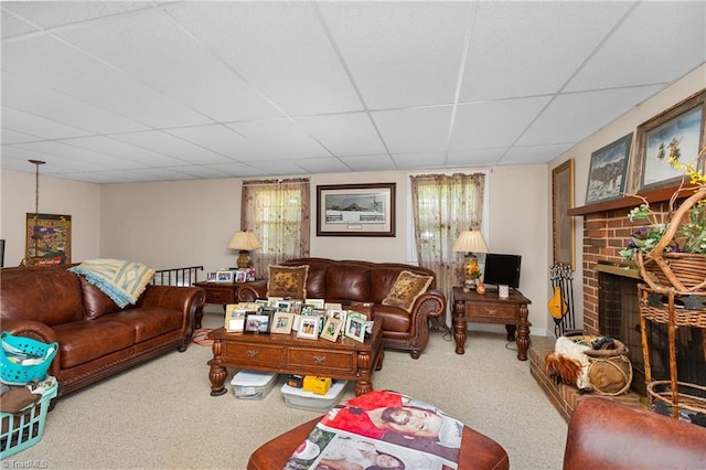 6115 Winview Heights St, Clemmons, NC 27012 - living area featuring carpet flooring, a paneled ceiling, and a brick fireplace