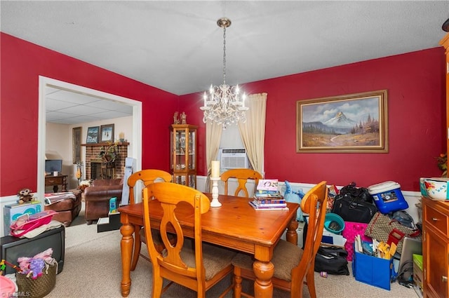 6115 Winview Heights St, Clemmons, NC 27012 - carpeted dining space featuring a chandelier
