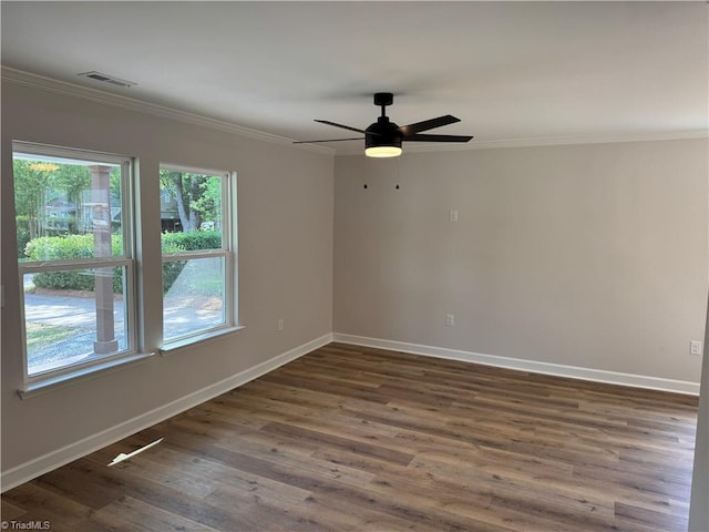 2322 Fernwood Dr, Greensboro, NC 27408 - spare room with crown molding, baseboards, dark wood finished floors, and ceiling fan