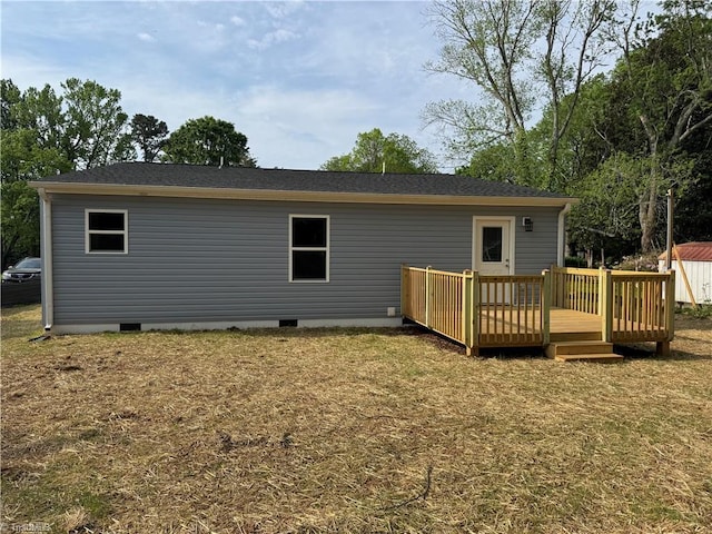 2322 Fernwood Dr, Greensboro, NC 27408 - back of property featuring crawl space, a deck, and a lawn