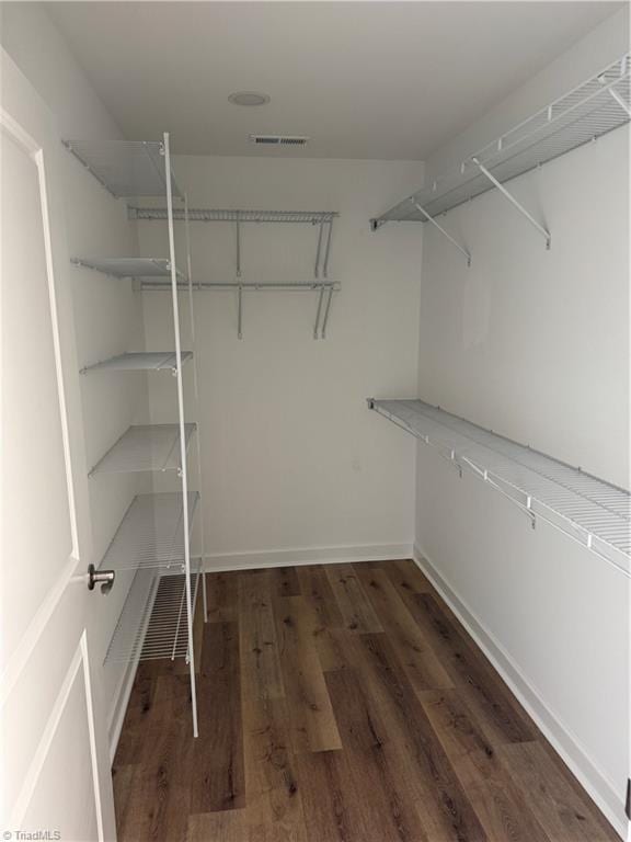2322 Fernwood Dr, Greensboro, NC 27408 - spacious closet featuring wood finished floors