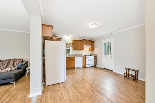 78 Arnies Ln, Sparta, NC 28675 - kitchen featuring white appliances, light countertops, ornamental molding, open floor plan, and light wood-type flooring