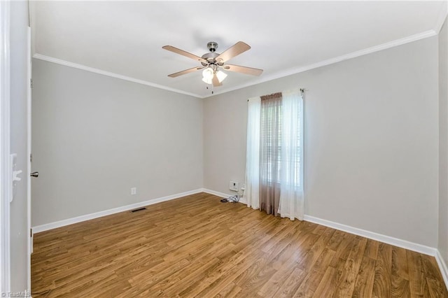 78 Arnies Ln, Sparta, NC 28675 - empty room featuring ceiling fan, baseboards, light wood-style floors, and ornamental molding