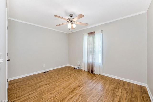 78 Arnies Ln, Sparta, NC 28675 - spare room featuring baseboards, ceiling fan, light wood-type flooring, and crown molding