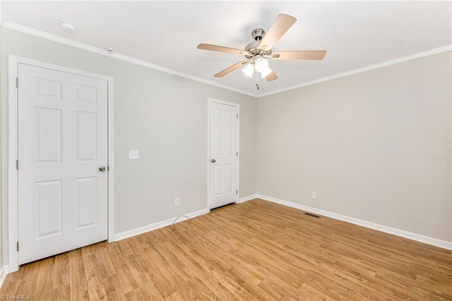 78 Arnies Ln, Sparta, NC 28675 - unfurnished room featuring light wood-type flooring, a ceiling fan, baseboards, crown molding, and a smoke detector