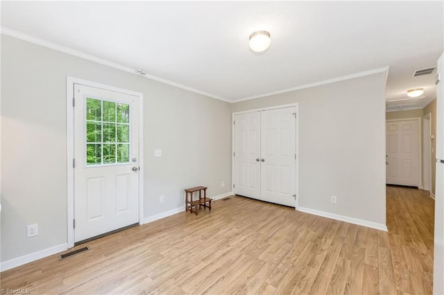 78 Arnies Ln, Sparta, NC 28675 - entryway with light wood-type flooring, crown molding, and baseboards