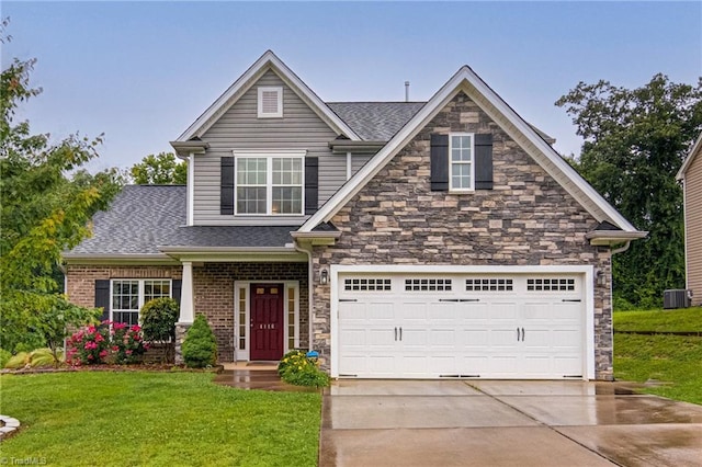 4116 Branch Point Ct, Pfafftown, NC 27040 - view of front of property featuring concrete driveway, a front yard, central AC, and stone siding