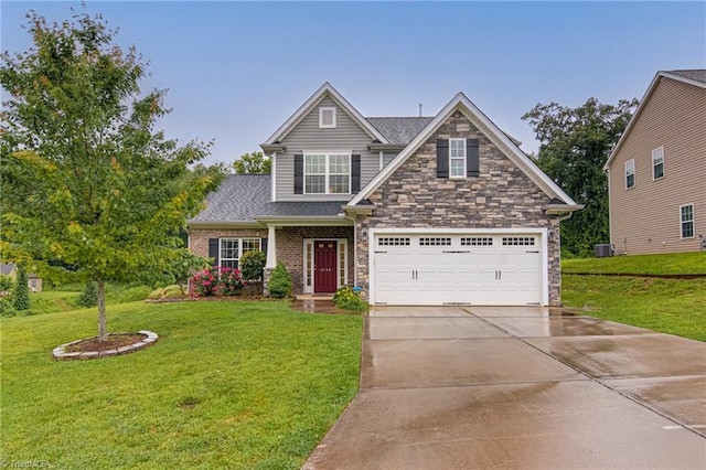 4116 Branch Point Ct, Pfafftown, NC 27040 - view of front of property featuring driveway, a front lawn, stone siding, and a garage