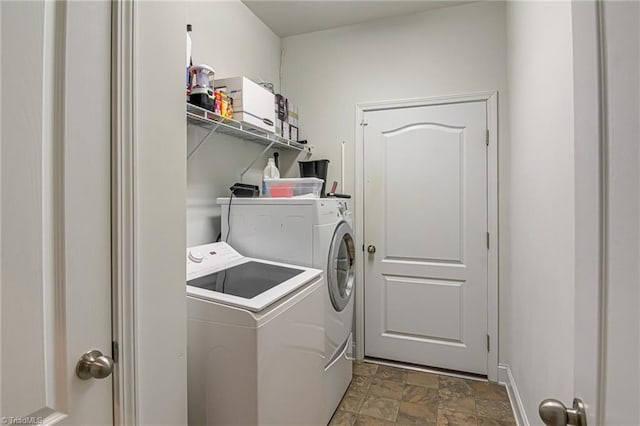 4116 Branch Point Ct, Pfafftown, NC 27040 - washroom with separate washer and dryer and stone finish flooring