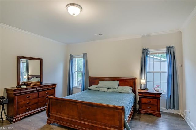 4116 Branch Point Ct, Pfafftown, NC 27040 - bedroom with crown molding, dark wood finished floors, and baseboards