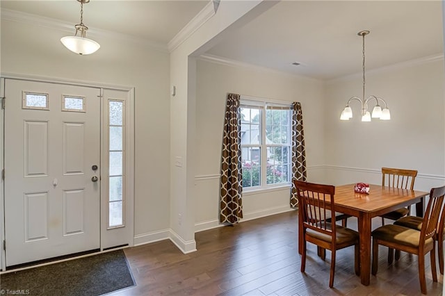 4116 Branch Point Ct, Pfafftown, NC 27040 - dining area with a chandelier, dark wood-style flooring, baseboards, and ornamental molding