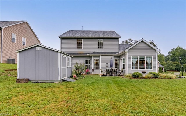4116 Branch Point Ct, Pfafftown, NC 27040 - rear view of house with a yard and central AC unit
