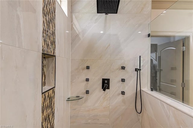 full bath featuring a tile shower