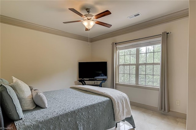 bedroom with visible vents, ornamental molding, baseboards, and a ceiling fan