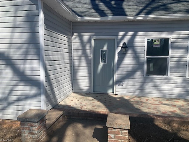 744 Caleb St, Eden, NC 27288 - view of exterior entry with roof with shingles