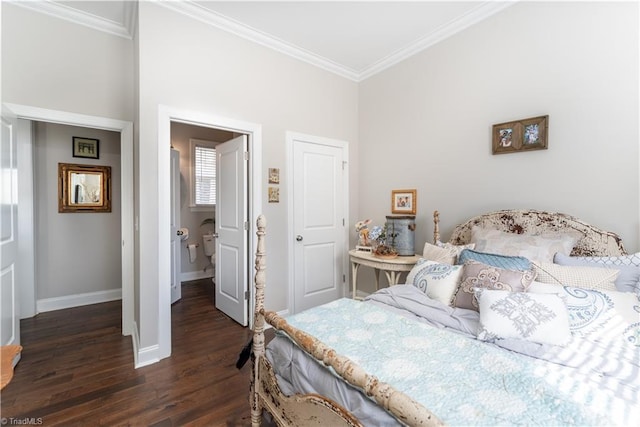 bedroom with crown molding, baseboards, and dark wood-style flooring