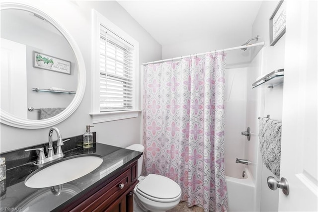 full bath with shower / bath combo with shower curtain, toilet, and vanity