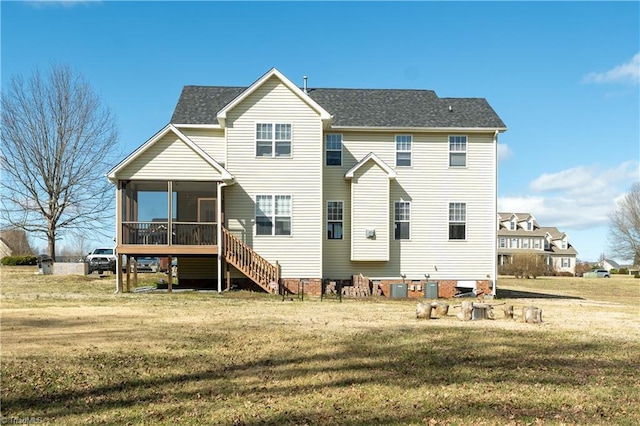 back of property featuring cooling unit, a yard, a sunroom, a shingled roof, and stairs