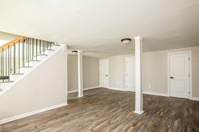 basement with dark wood-type flooring