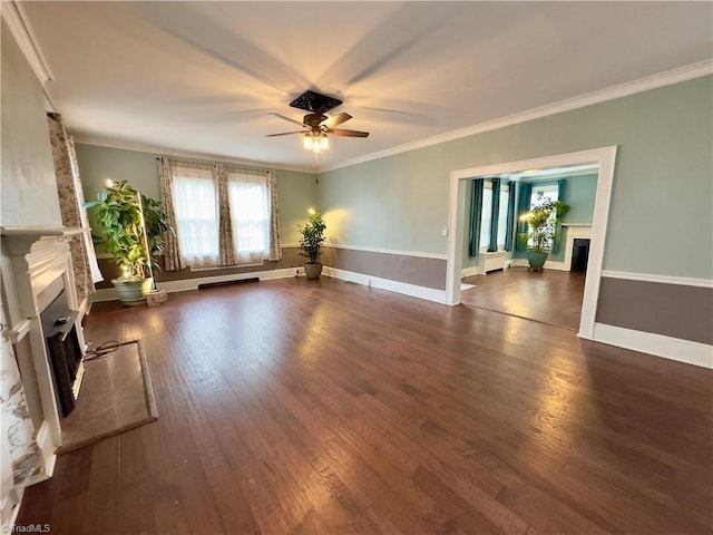 216 Rawley Ave, Mount Airy, NC 27030 - unfurnished living room with a fireplace, ceiling fan, ornamental molding, wood finished floors, and baseboards