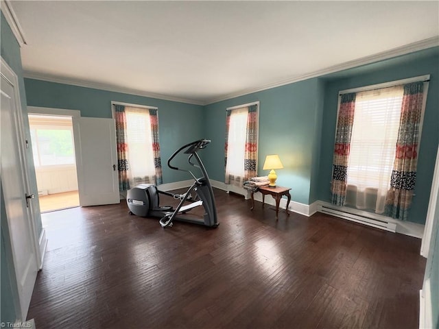 216 Rawley Ave, Mount Airy, NC 27030 - workout room with a baseboard heating unit, wood finished floors, ornamental molding, and baseboards