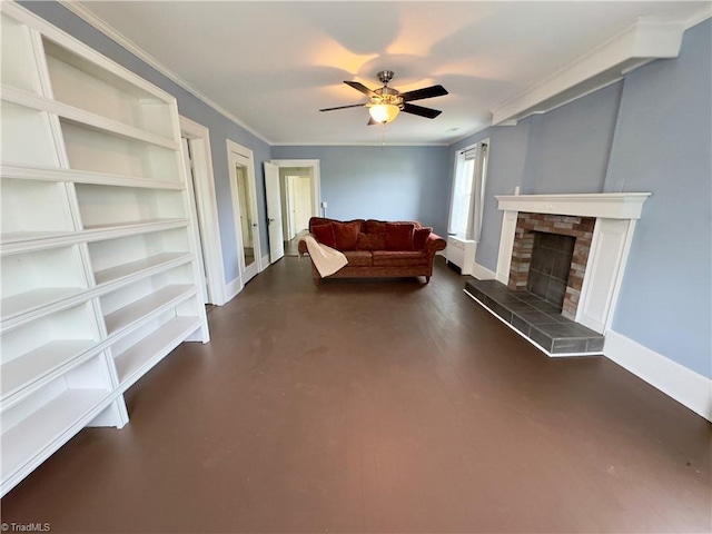 216 Rawley Ave, Mount Airy, NC 27030 - living area featuring a ceiling fan, baseboards, a fireplace with raised hearth, and ornamental molding