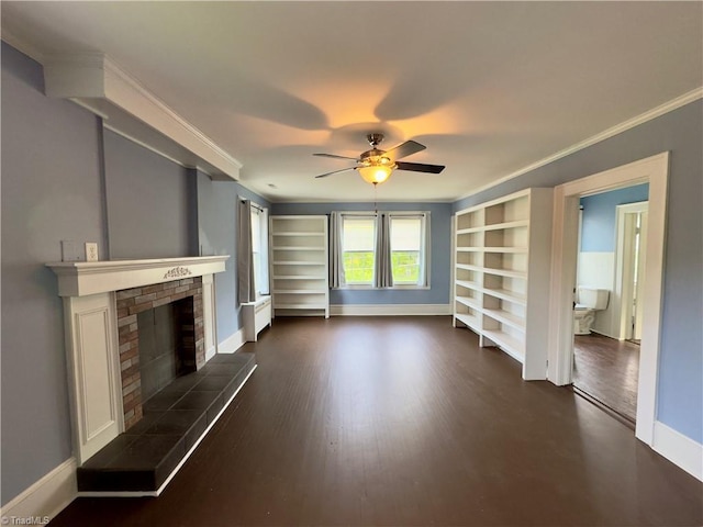 216 Rawley Ave, Mount Airy, NC 27030 - unfurnished living room featuring baseboards, ceiling fan, a fireplace, dark wood-style floors, and ornamental molding