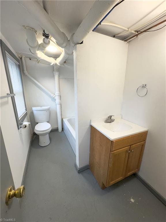 216 Rawley Ave, Mount Airy, NC 27030 - full bath featuring toilet, a bathtub, vanity, finished concrete floors, and a shower