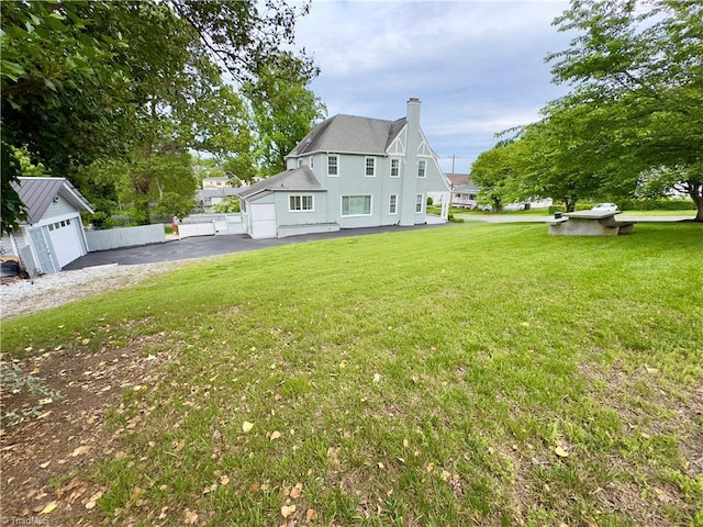 216 Rawley Ave, Mount Airy, NC 27030 - view of property exterior with a chimney and stucco siding